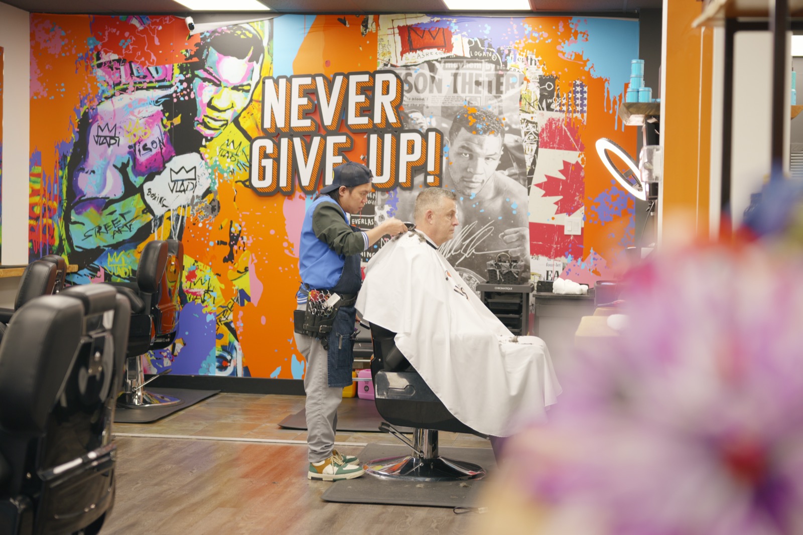 Cut underway in front of the Never Give Up mural